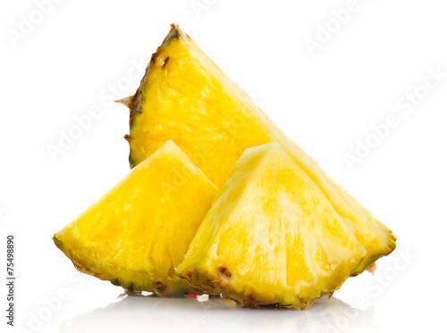 Fresh pineapple fruit slices isolated on white
