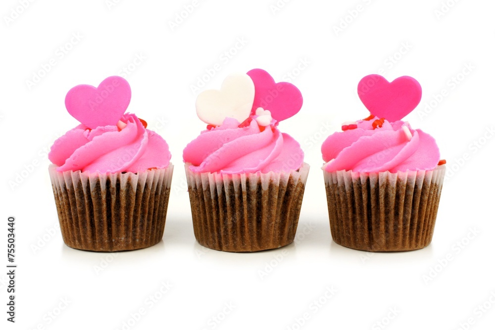 Chocolate Valentines Day cupcakes with pink frosting and hearts Chocolate Valentines Day cupcakes with pink frosting and hearts