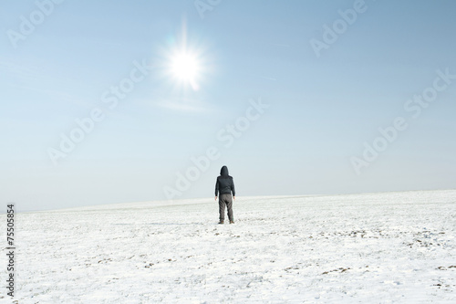 lone man in winter fields