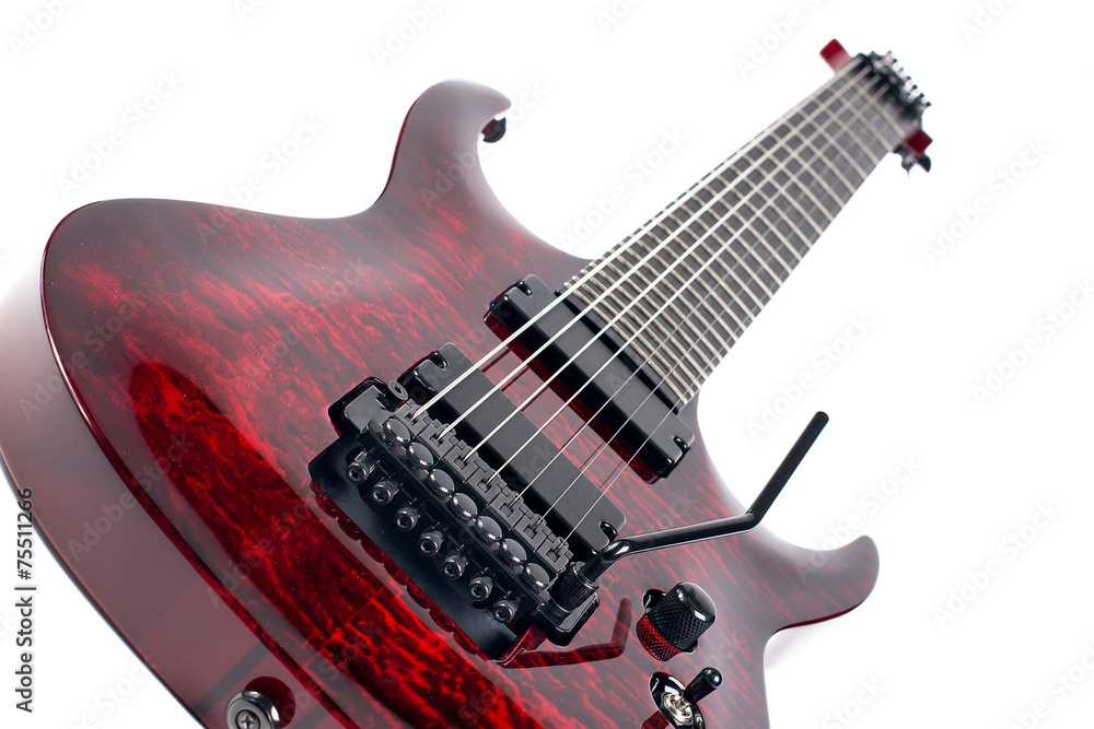 Obraz premium red seven-stringed electric guitar isolated on white background