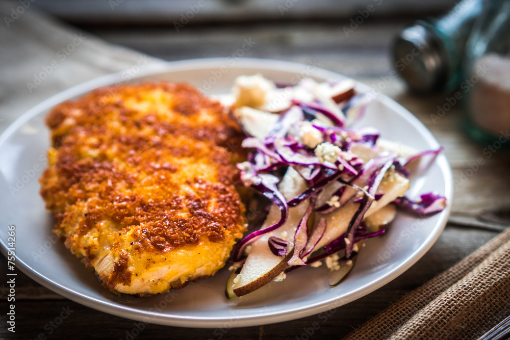 Chicken schnitzel with red cabbage,pears and gorgonzola Chicken schnitzel with red cabbage,pears and gorgonzola
