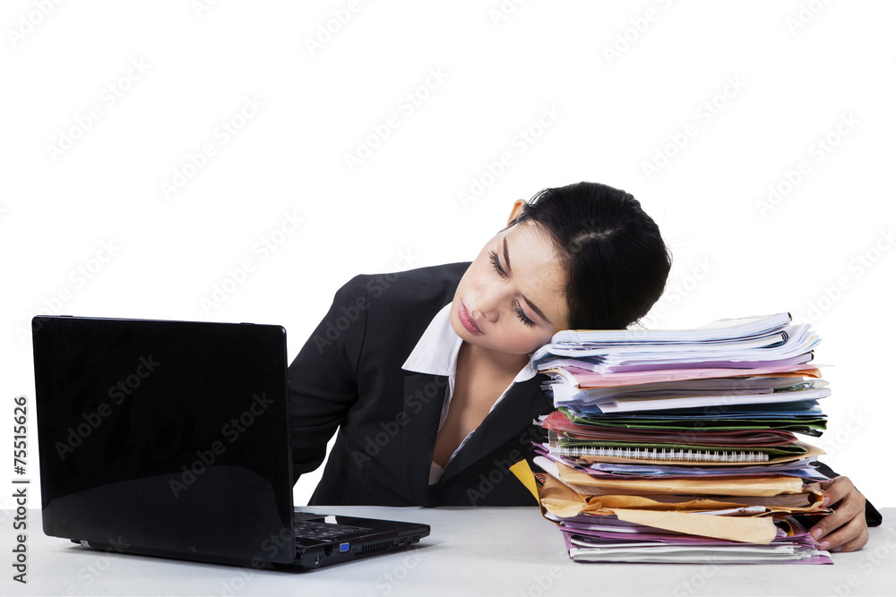 Tired young entrepreneur sleeping on documents Tired young entrepreneur sleeping on documents