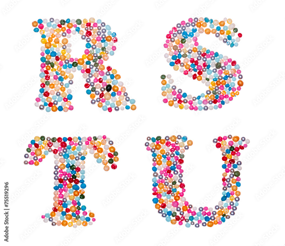 Capital characters made of colorful sprinkles Capital characters made of colorful sprinkles