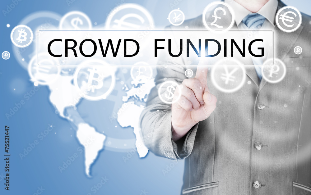 Businessman pushes virtual crowd funding button Businessman pushes virtual crowd funding button