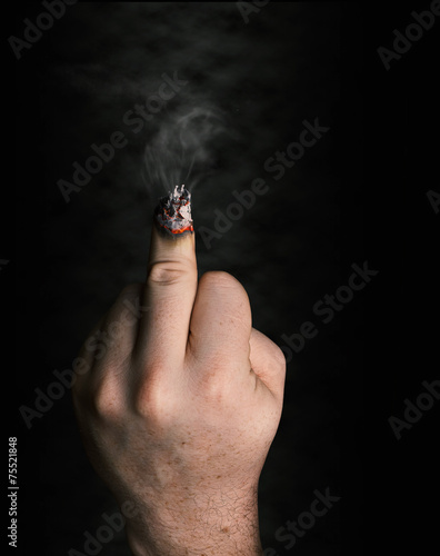 stop smoking concept. cigarette like a middle finger