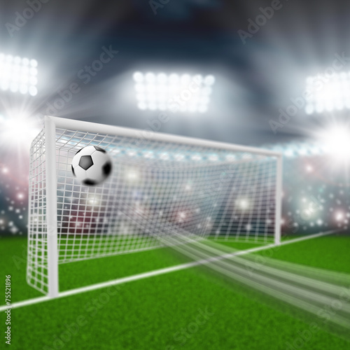 soccer ball flies into the goal