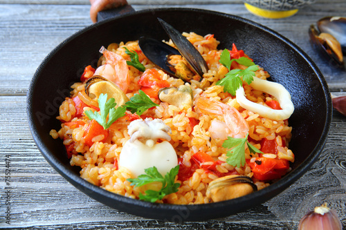 Paella with squid mussels