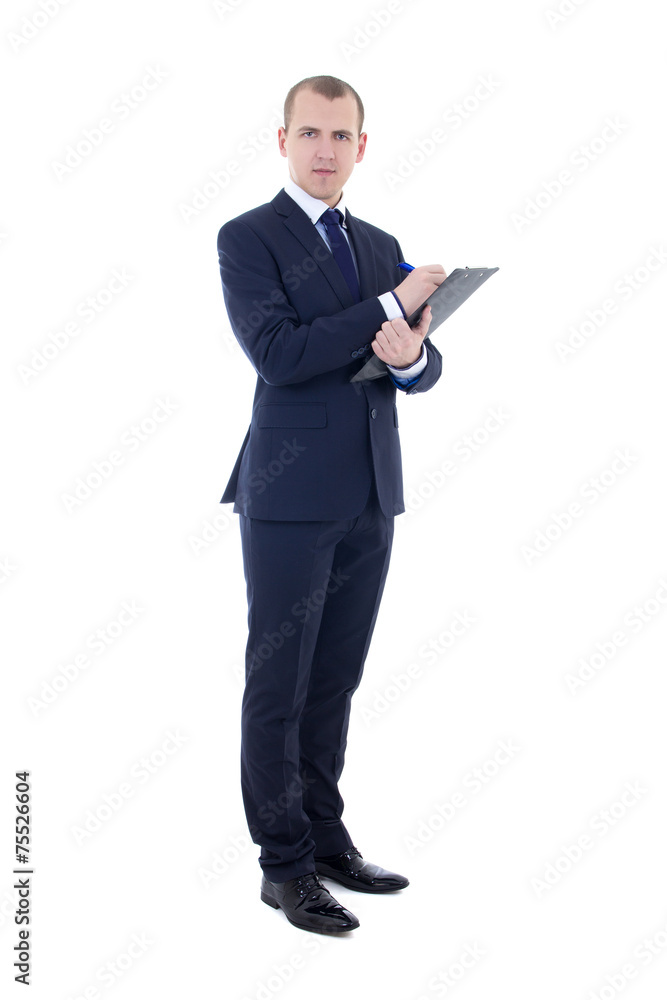full length portrait of young businessman in suit with pen and c