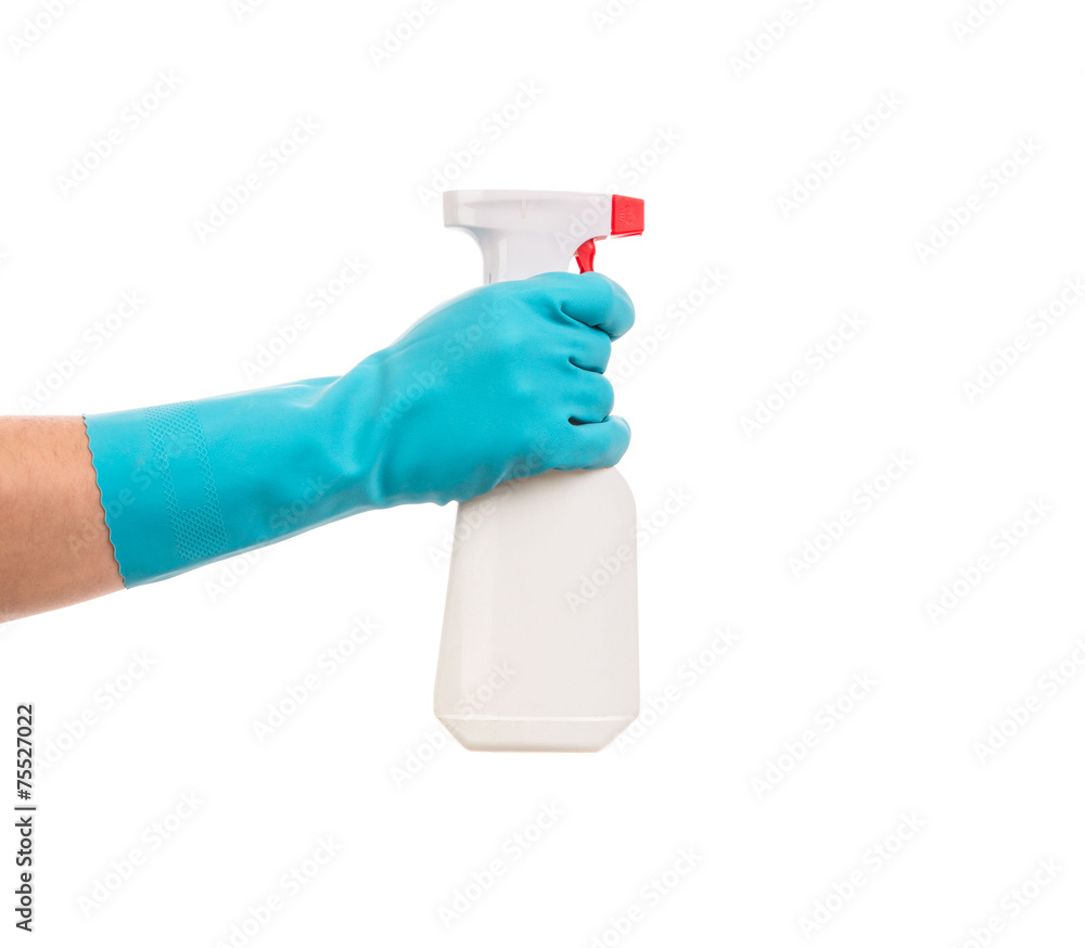Hand holds spray bottle. Hand holds spray bottle.