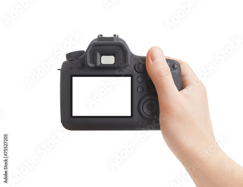 Camera in hand on white background
