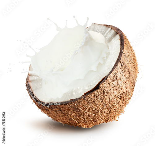 Coconuts with milk splash on white background