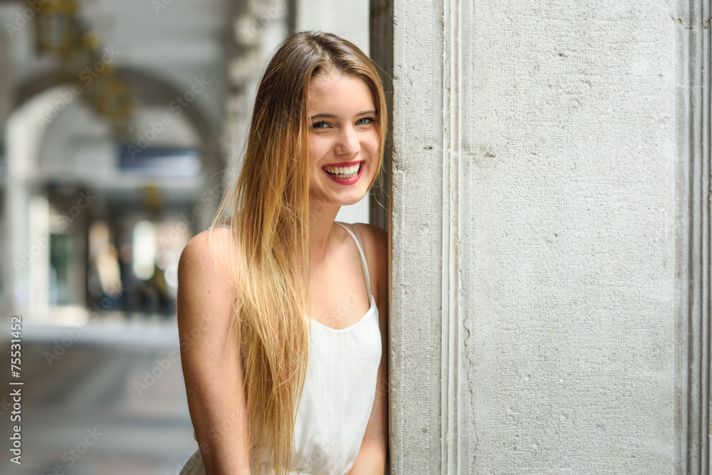 Beautiful blonde girl in urban background Beautiful blonde girl in urban background