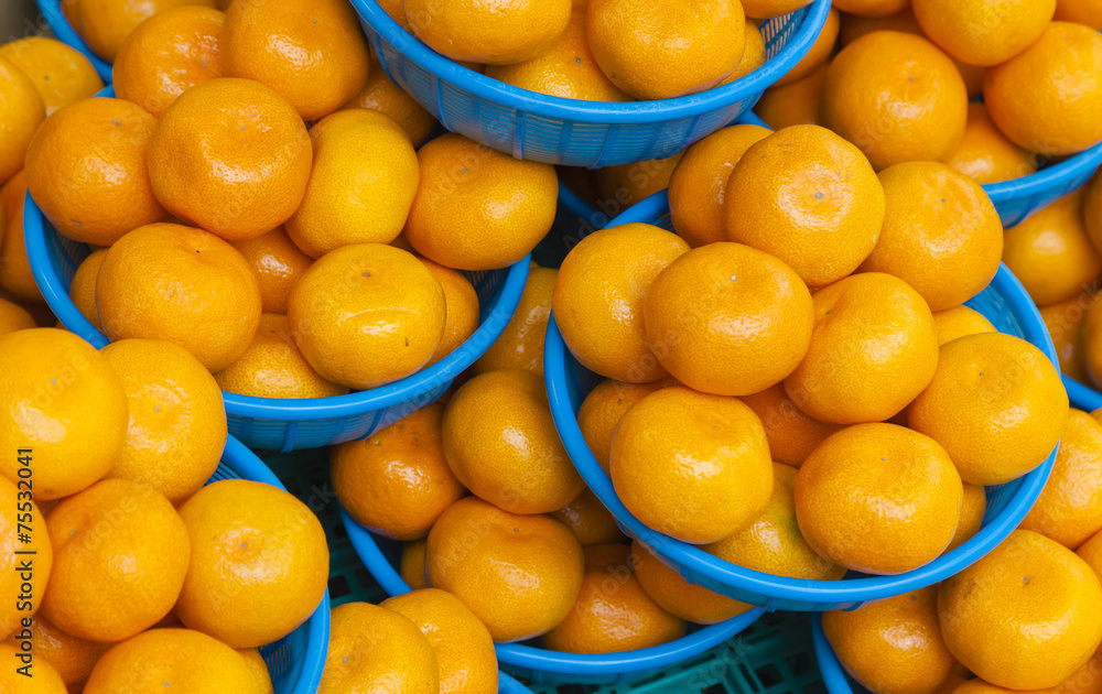 Oranges in baskets for sale in a food market