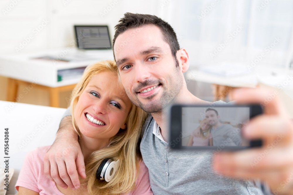 Young attractive couple having fun doing selfie Young attractive couple having fun doing selfie