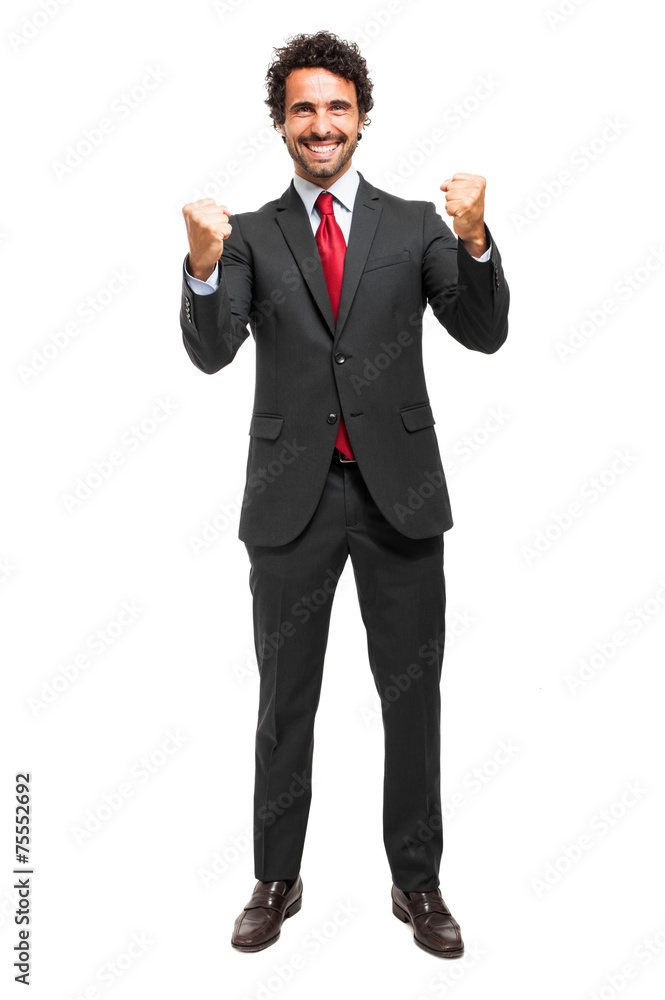 Businessman moving his arms in sign on victory Businessman moving his arms in sign on victory