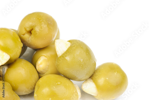 Green olives stuffed with almonds isolated on white background