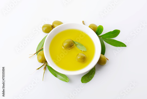 Pitted green olives and oil