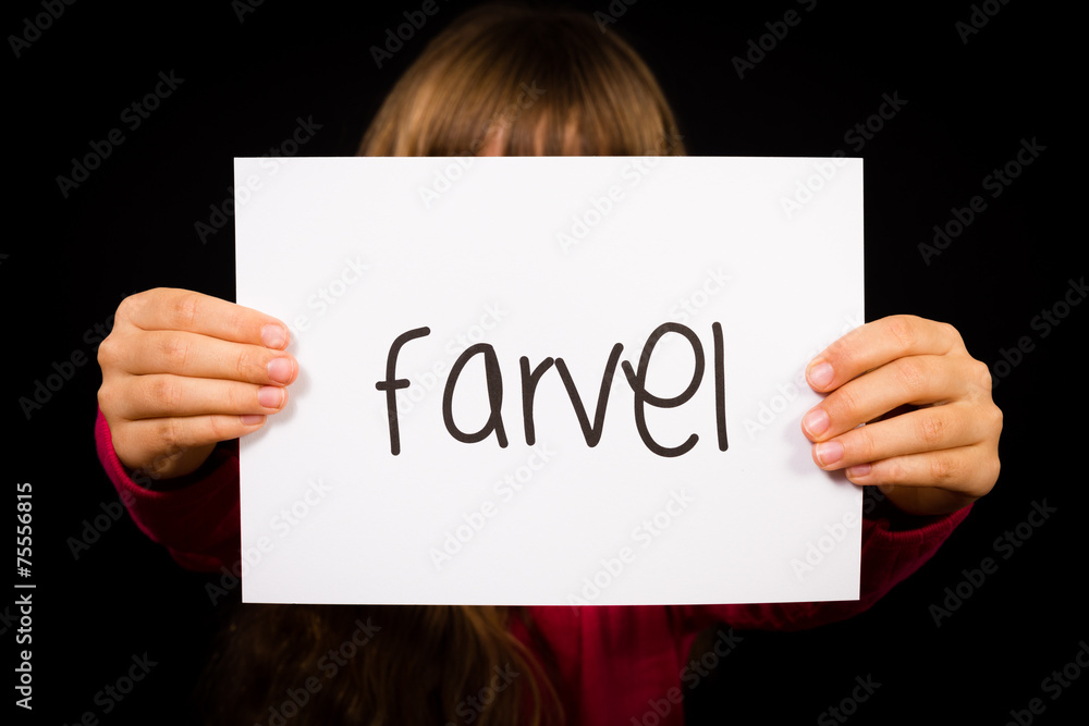 Child holding sign with Danish word Farvel - Bye Child holding sign with Danish word Farvel - Bye