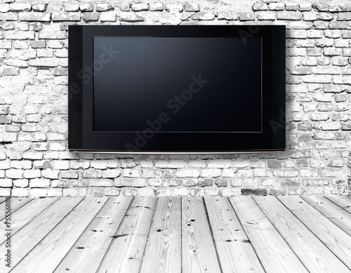 television set on an old wall