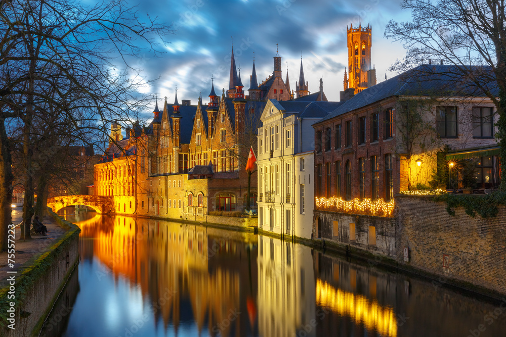 Fototapeta premium Cityscape with a tower Belfort and the Green canal in Bruges at