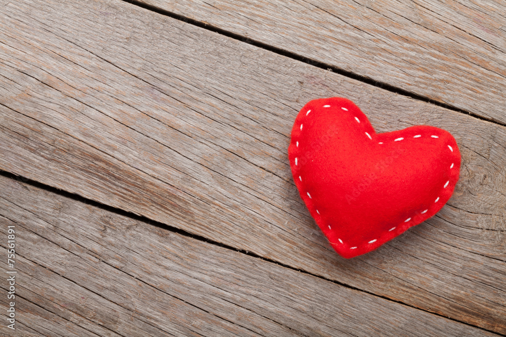 Fototapeta premium Valentines day background with handmade toy heart