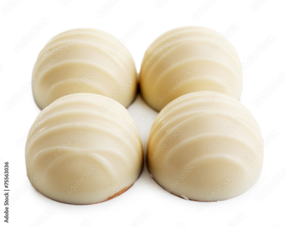 Delicious chocolate candies isolated on white Delicious chocolate candies isolated on white