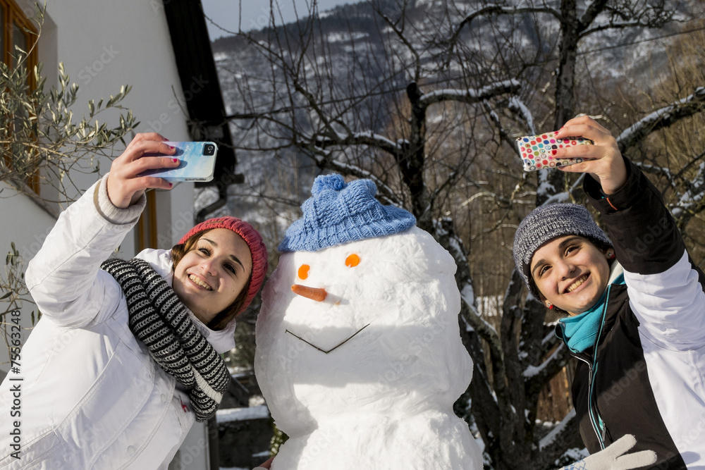 selfie with girls and snow man