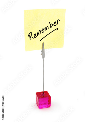 Canvas Print Remember text on a yellow note paper.