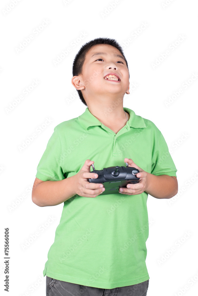Boy holding a radio remote control for helicopter, drone, plane Boy holding a radio remote control for helicopter, drone, plane