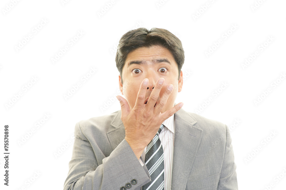 驚いた表情のビジネスマン 驚いた表情のビジネスマン