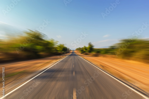 Motion blur road under blue sky
