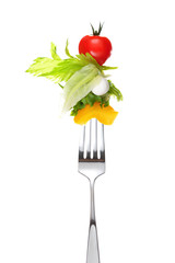 Mixed salad on fork isolated on white
