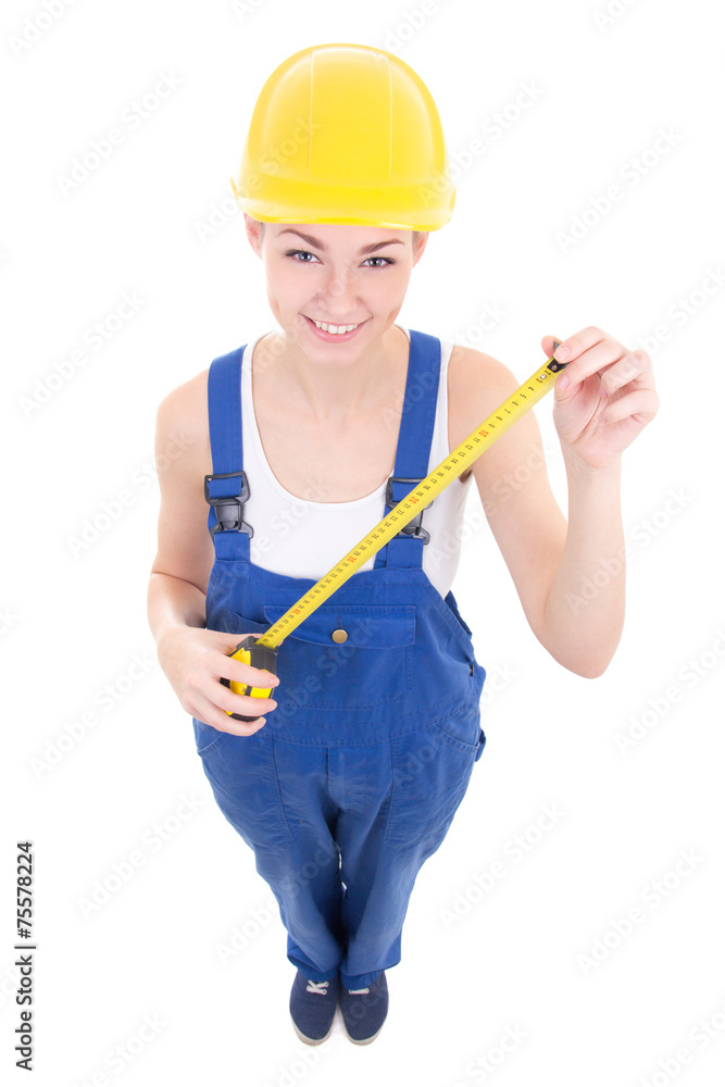 funny young attractive woman builder in workwear with measure ta funny young attractive woman builder in workwear with measure ta