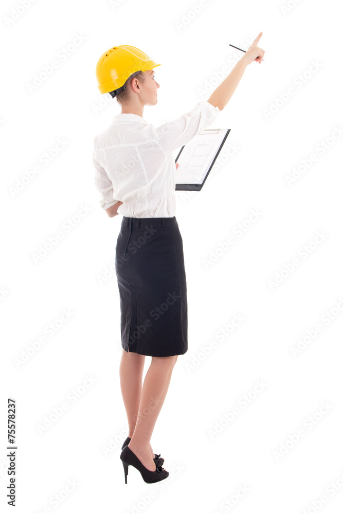 young beautiful business woman architect in builder helmet point young beautiful business woman architect in builder helmet point