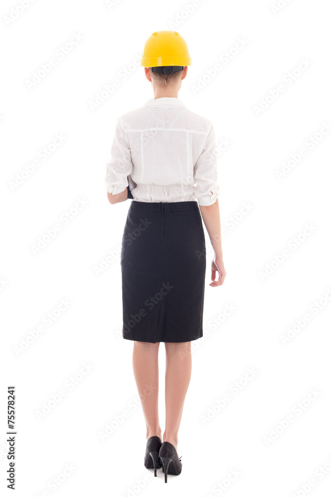 back view of young beautiful business woman architect in builder back view of young beautiful business woman architect in builder