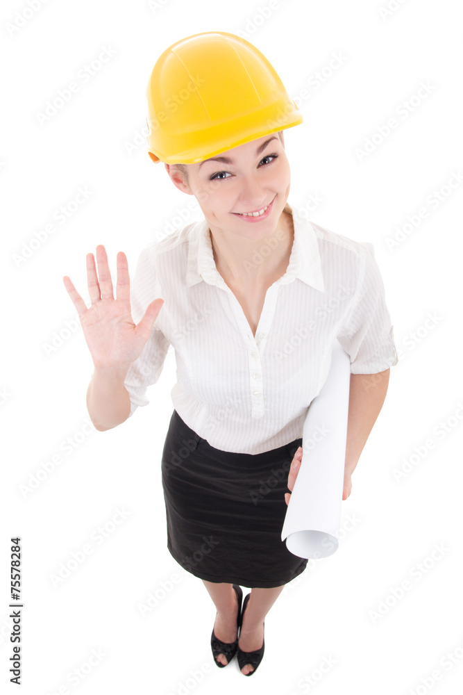 funny business woman architect in yellow builder helmet showing funny business woman architect in yellow builder helmet showing