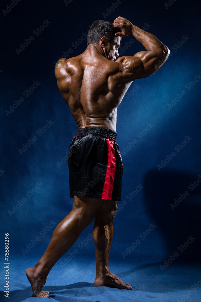 Portrait in full growth bodybuilder Portrait in full growth bodybuilder