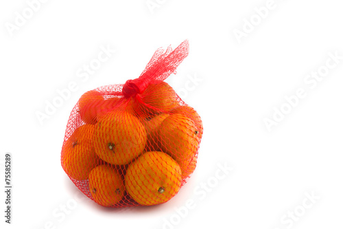 fresh Oranges Fruits In Mesh From Supermarket