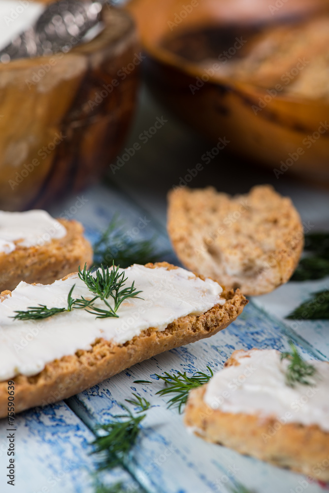 fresh dill with soft white cheese and wholegrain bread