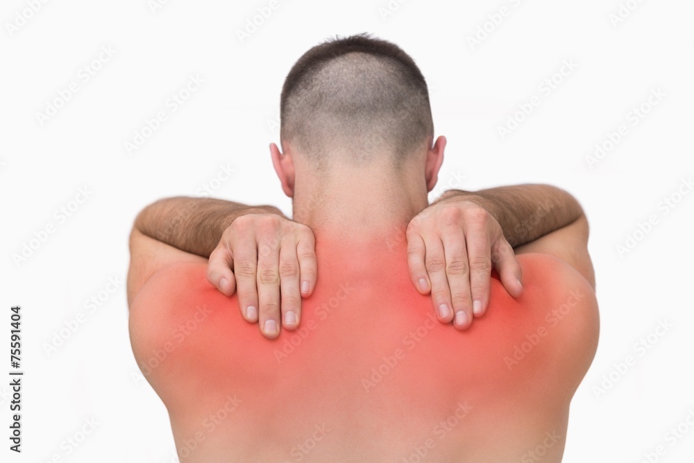 Rear view of shirtless man with shoulder pain