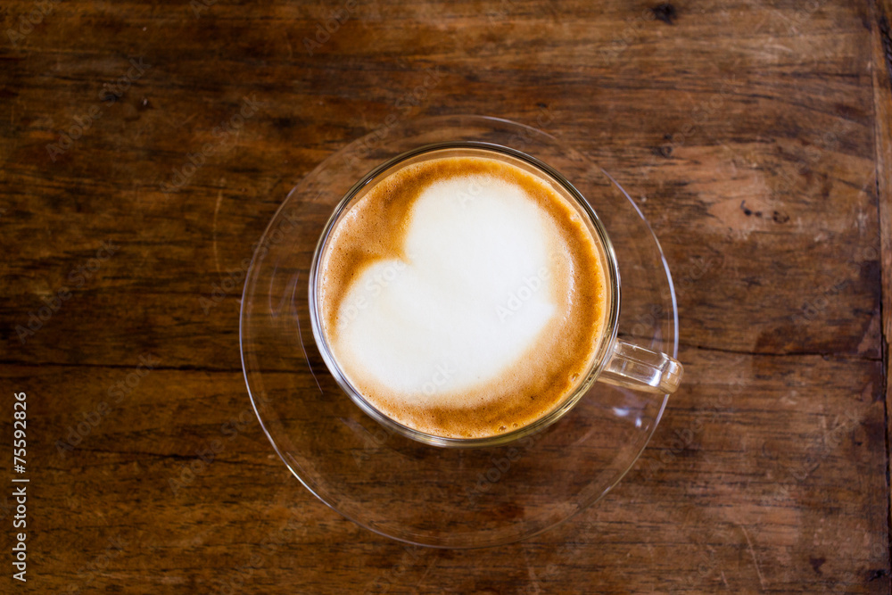 Cup of hot espresso coffee on wooden table. Cup of hot espresso coffee on wooden table.