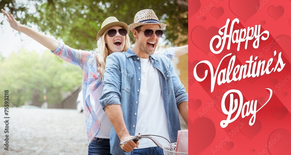 Fototapeta premium Composite image of hip young couple going for a bike ride