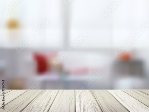 wooden table over blurred kitchen scene