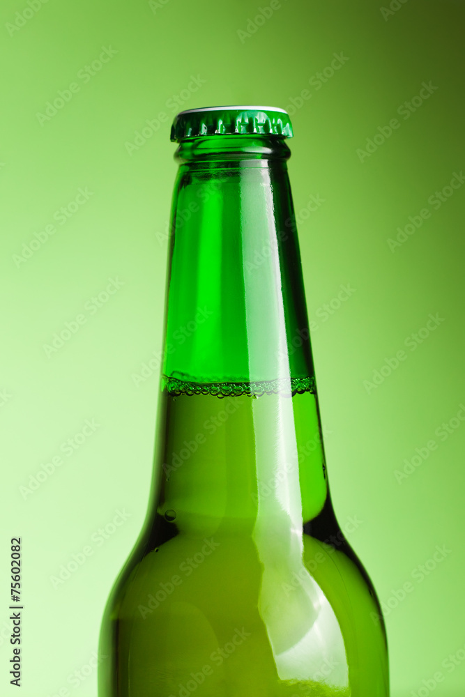 beer bottle on the green background beer bottle on the green background