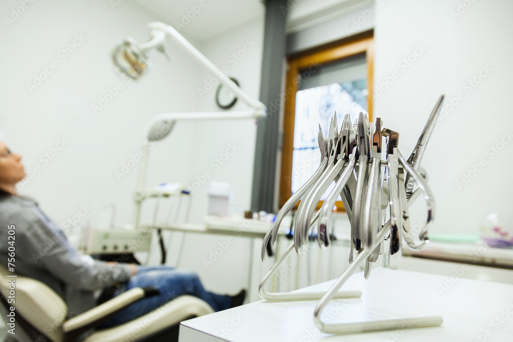Set Of Metal Dentist's Medical Equipment Tools In Dental Clinic Set Of Metal Dentist's Medical Equipment Tools In Dental Clinic