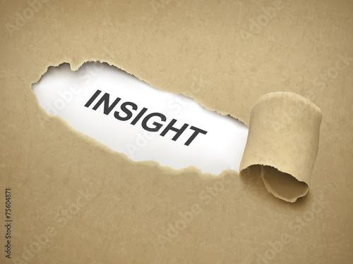 the word insight behind torn paper