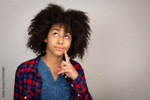 Young Teenage Girl With Afro Hair Thinking