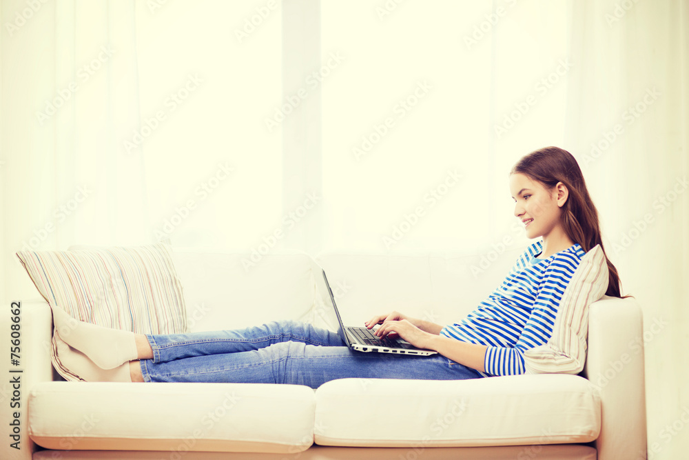 smiling teenage girl with laptop computer at home smiling teenage girl with laptop computer at home