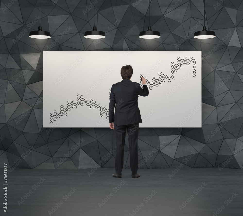 Fototapeta premium businessman drawing graph