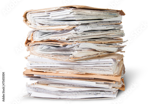 Old Files Stacking Up In A Messy Order